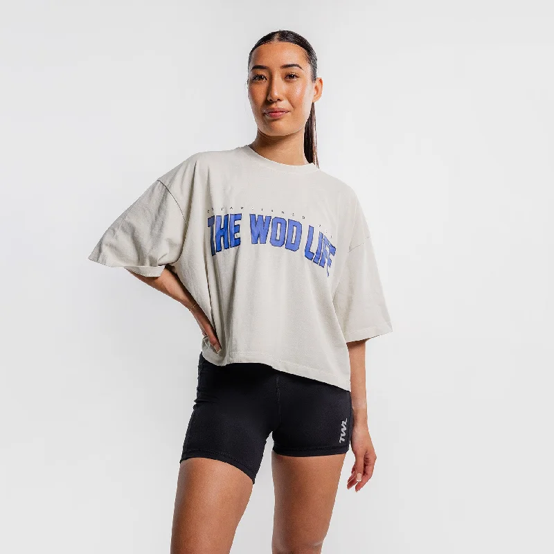 TWL - WOMEN'S LIFESTYLE OVERSIZED CROPPED T-SHIRT - VARSITY - WASHED CEMENT Zippered Front Buttoned Front Snap Front